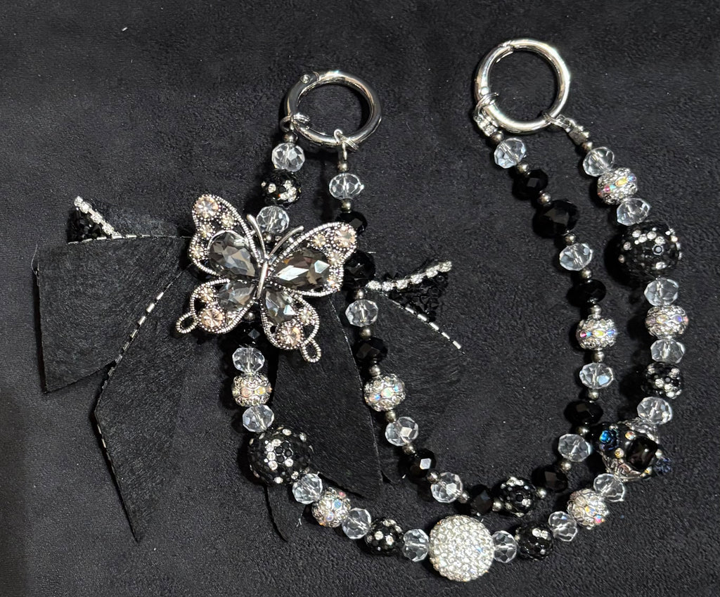 Black bow beaded charm with butterfly accent - alternate view