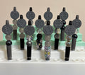 Beaded Zodiac Pens displayed in a stand, featuring all 12 zodiac sign medallions